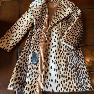 Genuine cheetah fur coat. Purchased in 1974.